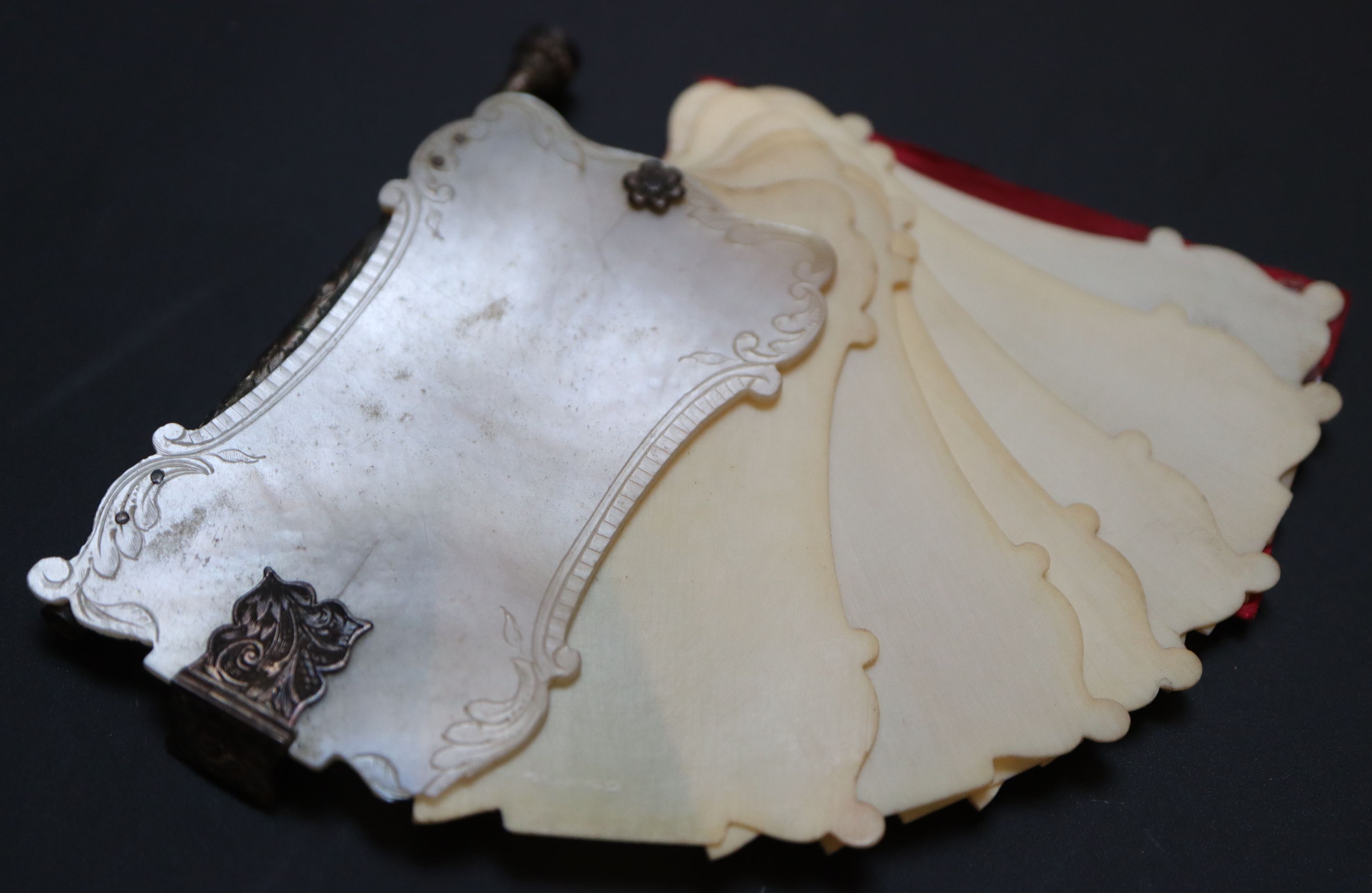 Six 19th century Palais Royale mother of pearl mounted dance cards and note cases largest 9cm